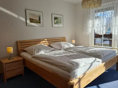 Ein Bett oder Betten in einem Zimmer der Unterkunft Haus Nordseewind - Apartment 2