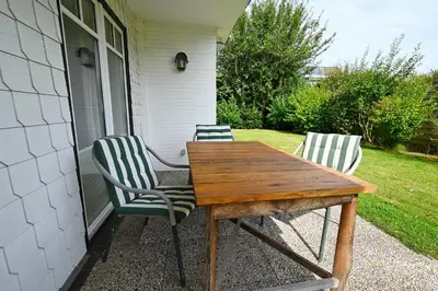 Ein Garten an der Unterkunft Ferienhaus Herzmuschel
