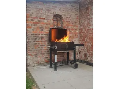 Ein für Gäste verfügbarer Grill im Ferienhaus