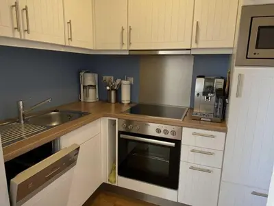 Küche/Küchenzeile in der Unterkunft luxury holiday apartment Duhnenblick