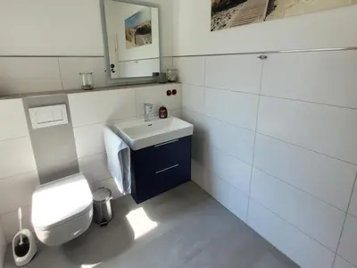 Ein Badezimmer in der Unterkunft Residenz Strandhaus Döse