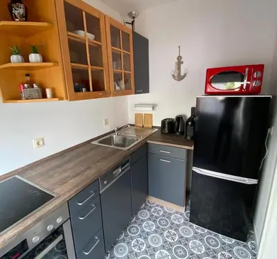 Küche/Küchenzeile in der Unterkunft Gemütliche Ferienwohnung im Lotsenviertel