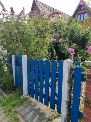 Ein Garten an der Unterkunft Tiny House - Kleines Glück auf dem Ostedeich