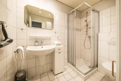 Ein Badezimmer in der Unterkunft Op de Westerwarft Wohnung 2