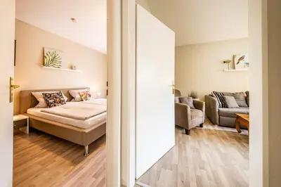 Ein Bett oder Betten in einem Zimmer der Unterkunft Op de Westerwarft Wohnung 2