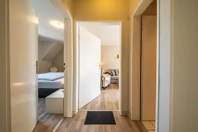 Ein Bett oder Betten in einem Zimmer der Unterkunft Op de Westerwarft Wohnung 4