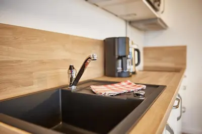 Küche/Küchenzeile in der Unterkunft Ferienwohnung mit Meerblick Grimmershörnbucht