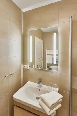 Ein Badezimmer in der Unterkunft Ferienwohnung mit Meerblick Grimmershörnbucht