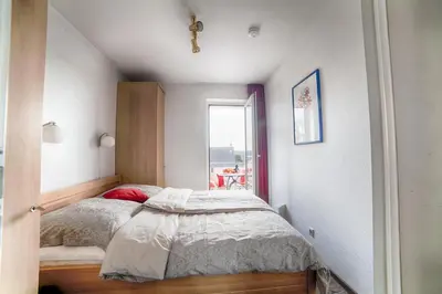 Ein Bett oder Betten in einem Zimmer der Unterkunft Robbenplate, Whng. 10