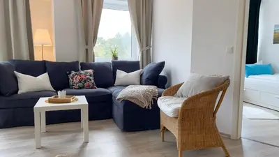Ein Sitzbereich in der Unterkunft Haus Nordseebrandung FeWo B2 3