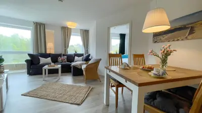 Ein Sitzbereich in der Unterkunft Haus Nordseebrandung FeWo B2 3