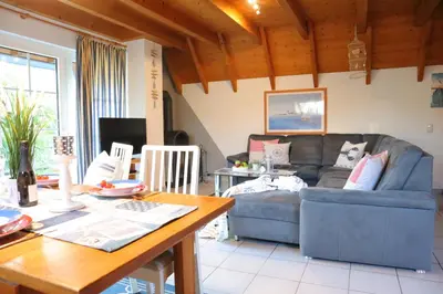 Ein Sitzbereich in der Unterkunft Ferienhaus Haase