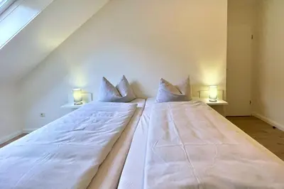 Ein Bett oder Betten in einem Zimmer der Unterkunft Ferienwohnungen Reimann Wohnung 11