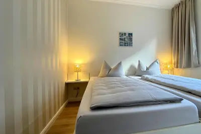 Ein Bett oder Betten in einem Zimmer der Unterkunft Ferienwohnungen Reimann Wohnung 1
