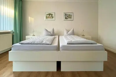 Ein Bett oder Betten in einem Zimmer der Unterkunft Ferienwohnungen Reimann Wohnung 3