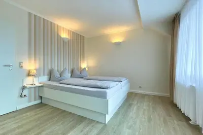Ein Bett oder Betten in einem Zimmer der Unterkunft Ferienwohnungen Reimann Wohnung 15