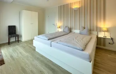 Ein Bett oder Betten in einem Zimmer der Unterkunft Ferienwohnungen Reimann Wohnung 15