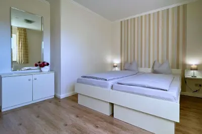 Ein Bett oder Betten in einem Zimmer der Unterkunft Ferienwohnungen Reimann Wohnung 10