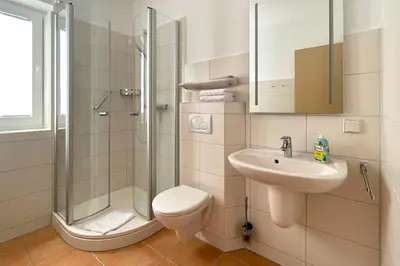 Ein Badezimmer in der Unterkunft Ferienwohnungen Reimann Wohnung 10