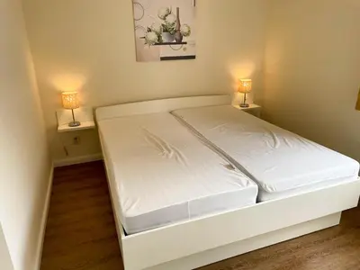 Ein Bett oder Betten in einem Zimmer der Unterkunft Ferienwohnungen Reimann Wohnung 5