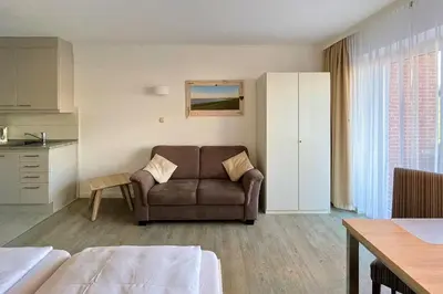 Ein Sitzbereich in der Unterkunft Ferienwohnungen Reimann Wohnung 07