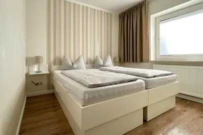 Ein Bett oder Betten in einem Zimmer der Unterkunft Ferienwohnungen Reimann Wohnung 9