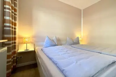 Ein Bett oder Betten in einem Zimmer der Unterkunft Ferienwohnungen Reimann Wohnung 8
