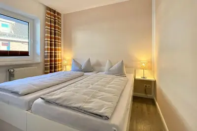 Ein Bett oder Betten in einem Zimmer der Unterkunft Ferienwohnungen Reimann Wohnung 8