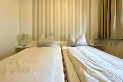 Ein Bett oder Betten in einem Zimmer der Unterkunft Ferienwohnungen Reimann Wohnung 6