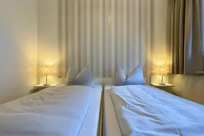 Ein Bett oder Betten in einem Zimmer der Unterkunft Ferienwohnungen Reimann Wohnung 6