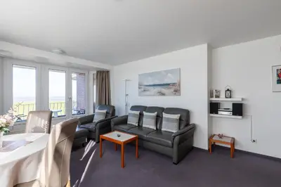 Ein Sitzbereich in der Unterkunft Haus Nordseeperle Wohnung 6