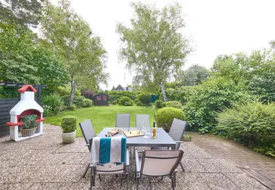 Ein Garten an der Unterkunft Utspannen