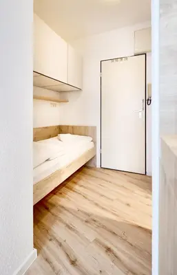 Ein Bett oder Betten in einem Zimmer der Unterkunft Seehütte - 205