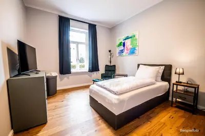 TV/Unterhaltungsangebot in der Unterkunft 4 Zimmer neues luxuriöses City Apartment Terrasse tolle Einzelbetten ruhig