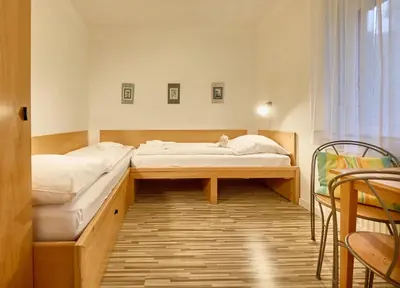 Ein Bett oder Betten in einem Zimmer der Unterkunft Anlage Am Wehrberg - Wohnung Eule