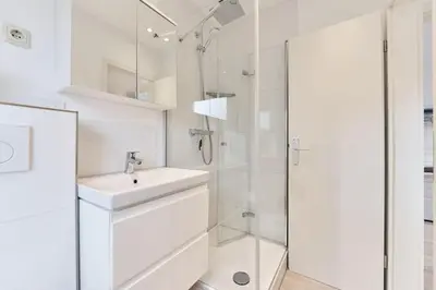 Ein Badezimmer in der Unterkunft Direkt an der Perlebucht - Wattn' Glück by Nordic Homes