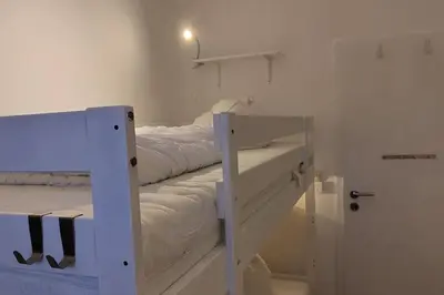 Ein Bett oder Betten in einem Zimmer der Unterkunft Ferienwohnung Deichkate - Auszeit an der Nordsee