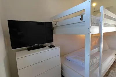 Ein Bett oder Betten in einem Zimmer der Unterkunft Ferienwohnung Deichkate - Auszeit an der Nordsee