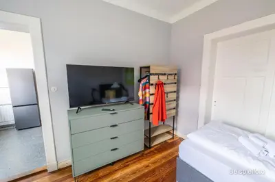 Ein Bett oder Betten in einem Zimmer der Unterkunft Apartment für Alleinreisende