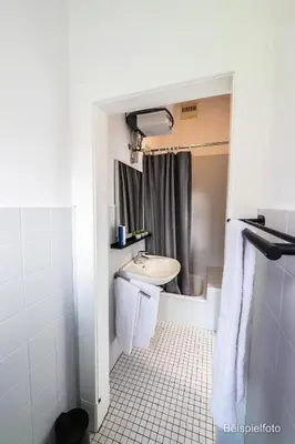 Ein Badezimmer in der Unterkunft Apartment für Alleinreisende