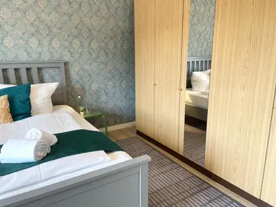 Ein Bett oder Betten in einem Zimmer der Unterkunft Nige Ooge FeWo 6