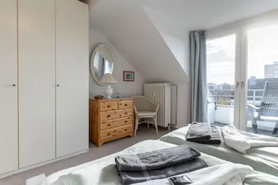 Ein Bett oder Betten in einem Zimmer der Unterkunft Ferienwohnung in Büsum