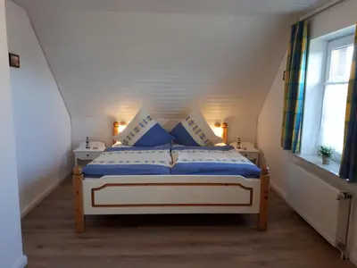 Ein Bett oder Betten in einem Zimmer der Unterkunft Ferienhaus Ankerglück