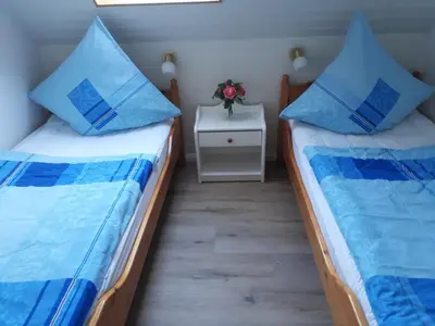 Ein Bett oder Betten in einem Zimmer der Unterkunft Ferienhaus Ankerglück