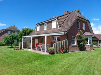 Ein Garten an der Unterkunft Ferienhaus Ankerglück
