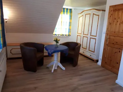 Ein Sitzbereich in der Unterkunft Ferienhaus Ankerglück