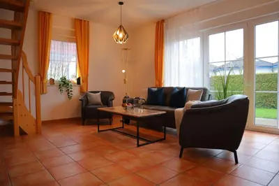 Ein Sitzbereich in der Unterkunft Villa am Meer - Fröhner