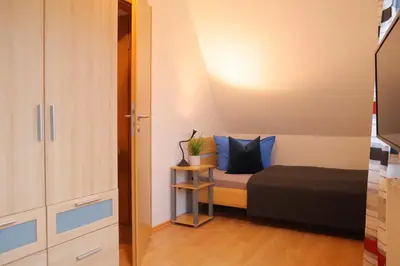 Ein Bett oder Betten in einem Zimmer der Unterkunft Villa am Meer - Fröhner