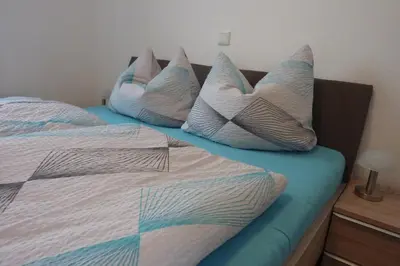 Ein Bett oder Betten in einem Zimmer der Unterkunft Ferienhaus Nordseebrise