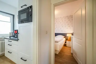 Ein Bett oder Betten in einem Zimmer der Unterkunft Haus Alleestraße Apartment 1